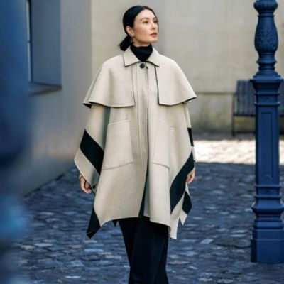 どちらを表にしても美しいリバーシブル仕様が魅力　リバーポンチョコート