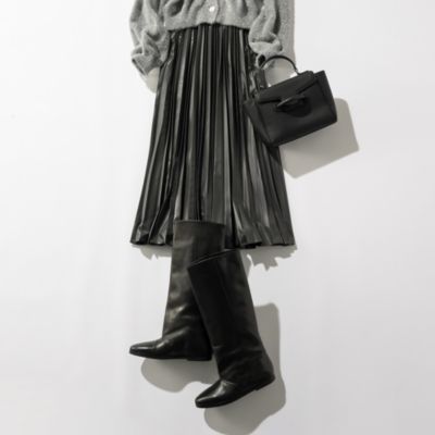 suadeo(スアデオ)のフェイクレザープリーツスカート通販