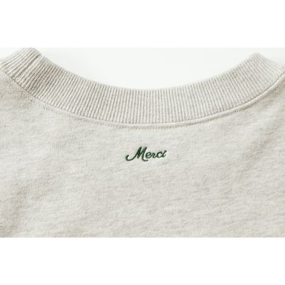 ��̌��ɁwMerci�x�̃��S����(�A�b�V���O���[×�O���[��)