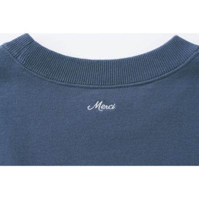 ��̌��ɁwMerci�x�̃��S����(�l�C�r�[×��)