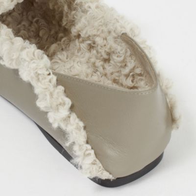 Sergio Rossi×eclat(セルジオ ロッシ×エクラ)の「sr1 Slippers」ボア