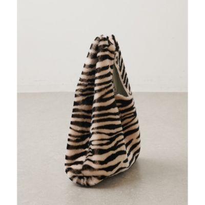 Whim Gazette(ウィム ガゼット)の【CARUS】ゼブラムートンバッグ通販